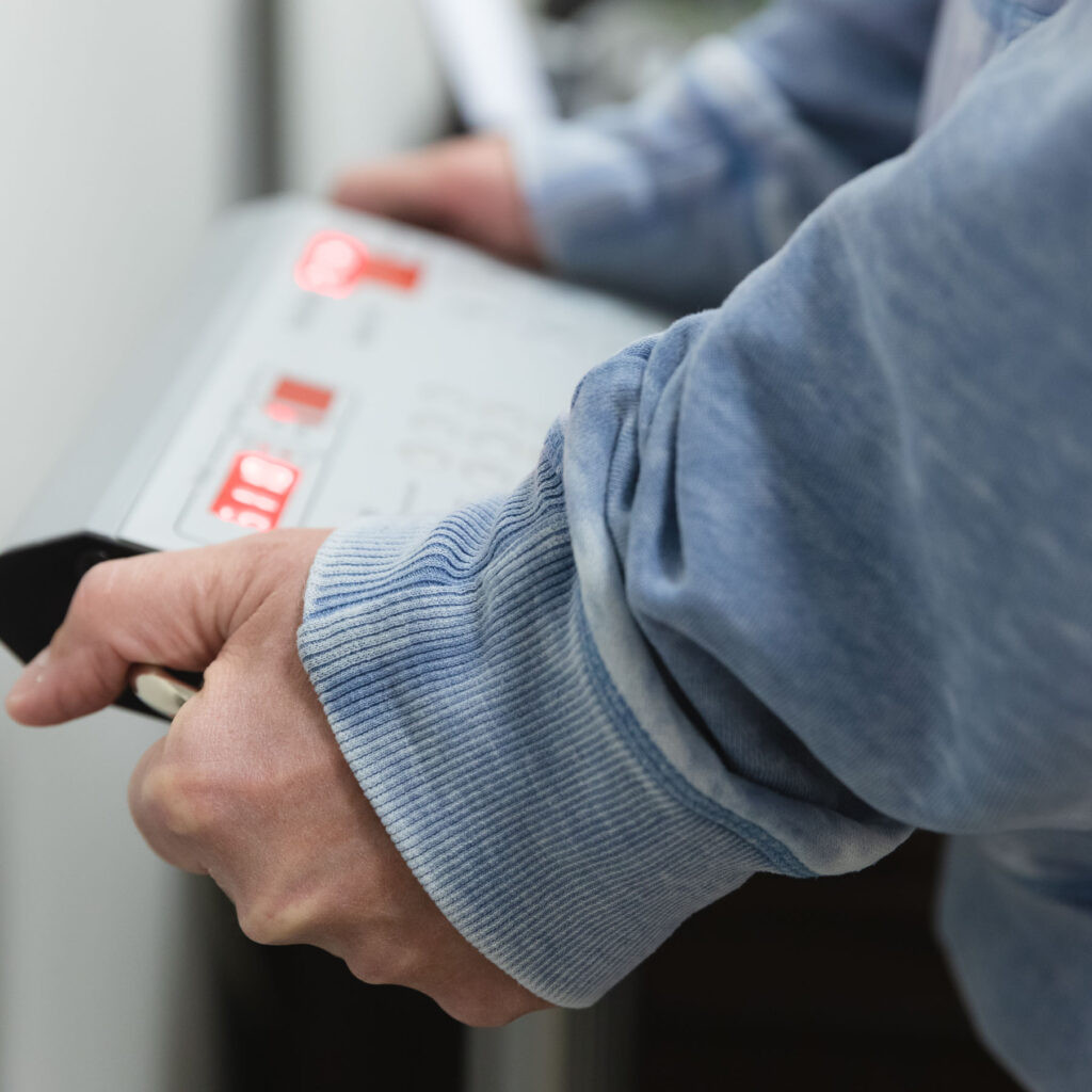 Close up of a person standing on a scale to measure their progress on semaglutide near Pittsburgh